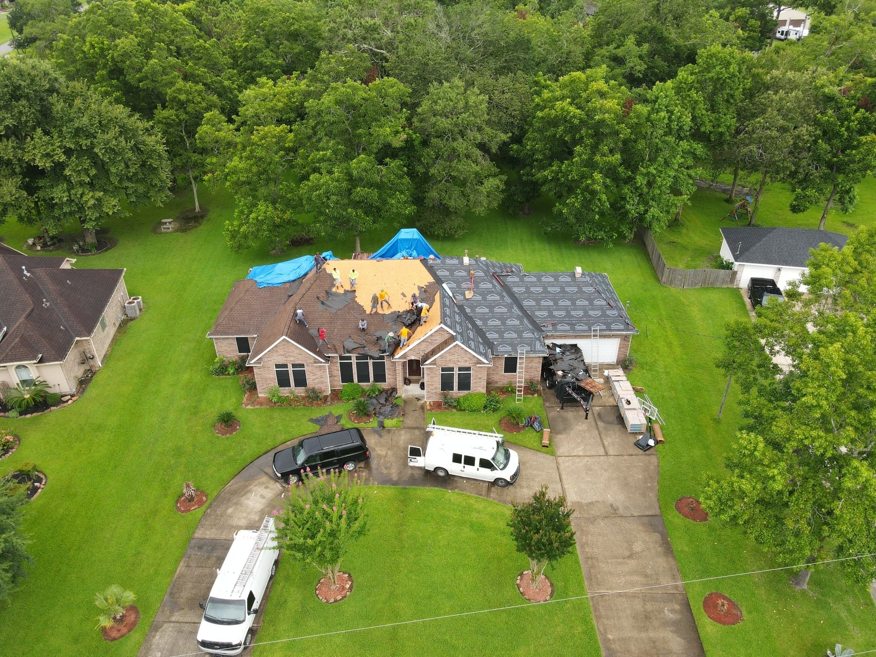 Roof tear-off in progress aerial view — Orange, Texas (photo 3)