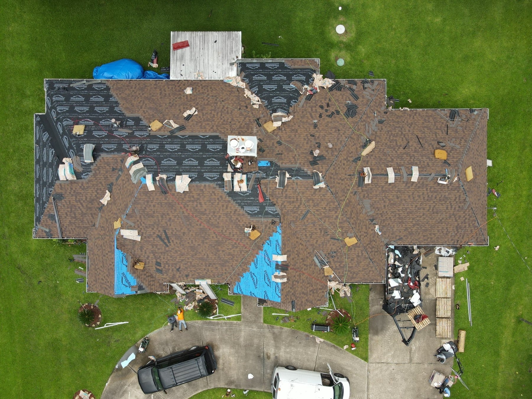 Shingle installation in progress aerial view — Orange, Texas (photo 6)